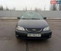Синий Тойота Авенсис, объемом двигателя 2 л и пробегом 440 тыс. км за 3800 $, фото 1 на Automoto.ua