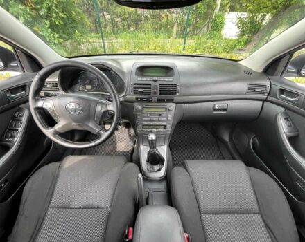 Синий Тойота Авенсис, объемом двигателя 2 л и пробегом 310 тыс. км за 5499 $, фото 4 на Automoto.ua