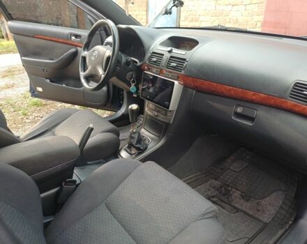 Синій Тойота Авенсіс, об'ємом двигуна 2 л та пробігом 227 тис. км за 7400 $, фото 4 на Automoto.ua