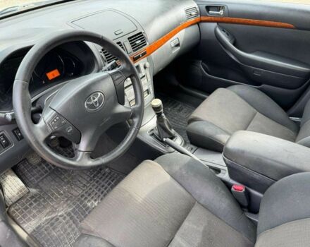 Синий Тойота Авенсис, объемом двигателя 2 л и пробегом 321 тыс. км за 2750 $, фото 4 на Automoto.ua