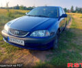 Синий Тойота Авенсис, объемом двигателя 2 л и пробегом 263 тыс. км за 3900 $, фото 1 на Automoto.ua
