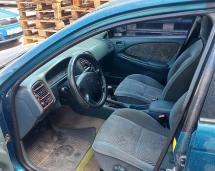 Зеленый Тойота Авенсис, объемом двигателя 1.76 л и пробегом 220 тыс. км за 2750 $, фото 5 на Automoto.ua