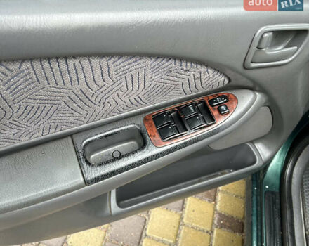 Зеленый Тойота Авенсис, объемом двигателя 1.8 л и пробегом 426 тыс. км за 3800 $, фото 12 на Automoto.ua