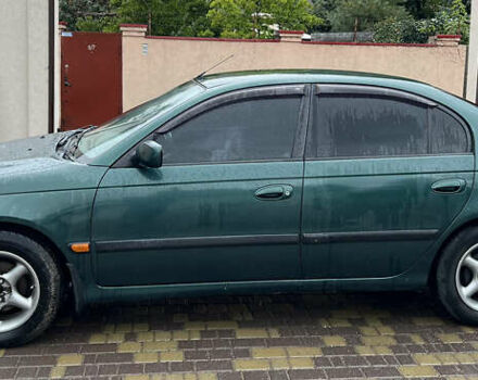 Зеленый Тойота Авенсис, объемом двигателя 1.8 л и пробегом 426 тыс. км за 3800 $, фото 1 на Automoto.ua