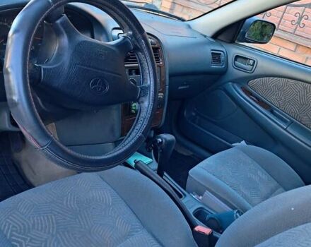 Зеленый Тойота Авенсис, объемом двигателя 1.8 л и пробегом 240 тыс. км за 4200 $, фото 7 на Automoto.ua