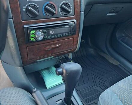 Зеленый Тойота Авенсис, объемом двигателя 1.8 л и пробегом 240 тыс. км за 4200 $, фото 5 на Automoto.ua