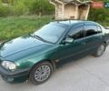 Зеленый Тойота Авенсис, объемом двигателя 1.59 л и пробегом 420 тыс. км за 3400 $, фото 1 на Automoto.ua