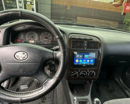 Зеленый Тойота Авенсис, объемом двигателя 2 л и пробегом 306 тыс. км за 4300 $, фото 11 на Automoto.ua