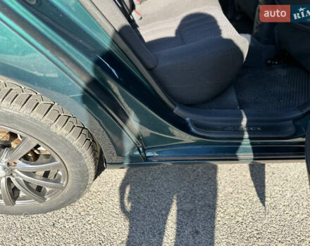 Зеленый Тойота Авенсис, объемом двигателя 2 л и пробегом 205 тыс. км за 4700 $, фото 12 на Automoto.ua