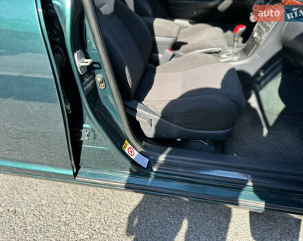 Зеленый Тойота Авенсис, объемом двигателя 2 л и пробегом 205 тыс. км за 4700 $, фото 15 на Automoto.ua