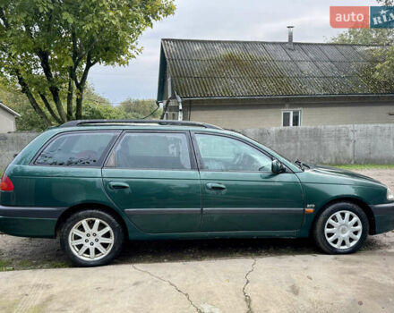 Зеленый Тойота Авенсис, объемом двигателя 2 л и пробегом 472 тыс. км за 3000 $, фото 3 на Automoto.ua