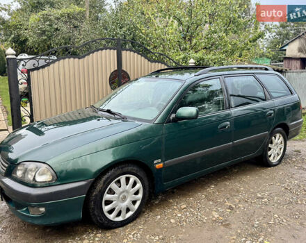 Зеленый Тойота Авенсис, объемом двигателя 2 л и пробегом 472 тыс. км за 3000 $, фото 1 на Automoto.ua