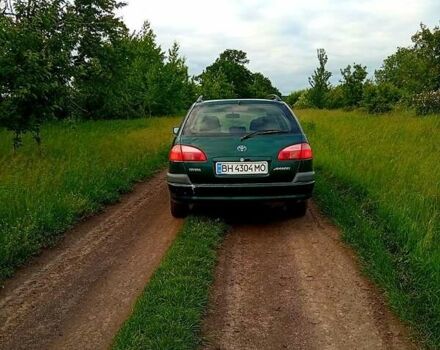 Зеленый Тойота Авенсис, объемом двигателя 1.8 л и пробегом 250 тыс. км за 3999 $, фото 2 на Automoto.ua