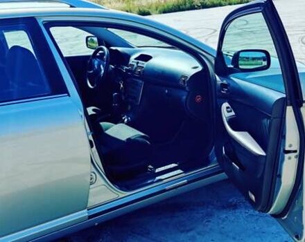 Зеленый Тойота Авенсис, объемом двигателя 2 л и пробегом 215 тыс. км за 6000 $, фото 10 на Automoto.ua