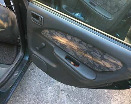 Зеленый Тойота Авенсис, объемом двигателя 1.8 л и пробегом 545 тыс. км за 2600 $, фото 8 на Automoto.ua