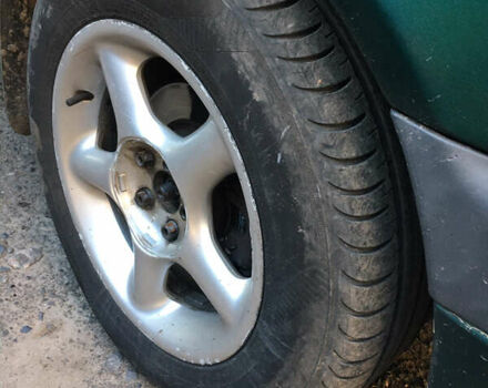 Зеленый Тойота Авенсис, объемом двигателя 1.8 л и пробегом 545 тыс. км за 2600 $, фото 9 на Automoto.ua