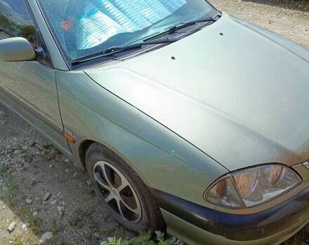 Зеленый Тойота Авенсис, объемом двигателя 2 л и пробегом 344 тыс. км за 3900 $, фото 4 на Automoto.ua