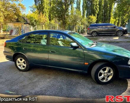 Зеленый Тойота Авенсис, объемом двигателя 2 л и пробегом 285 тыс. км за 3200 $, фото 2 на Automoto.ua
