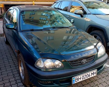 Зеленый Тойота Авенсис, объемом двигателя 2 л и пробегом 223 тыс. км за 3500 $, фото 1 на Automoto.ua