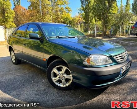 Зеленый Тойота Авенсис, объемом двигателя 2 л и пробегом 285 тыс. км за 3200 $, фото 1 на Automoto.ua