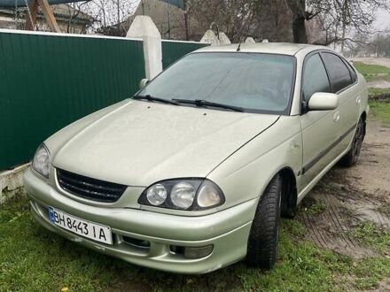 Зеленый Тойота Авенсис, объемом двигателя 1.8 л и пробегом 420 тыс. км за 2950 $, фото 1 на Automoto.ua