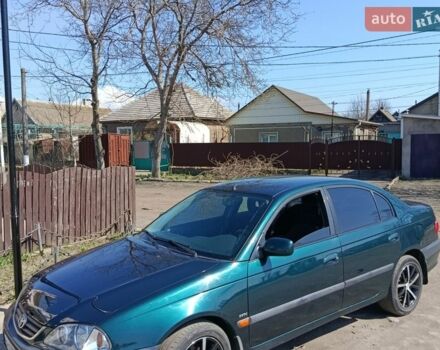 Зеленый Тойота Авенсис, объемом двигателя 1.79 л и пробегом 235 тыс. км за 3850 $, фото 1 на Automoto.ua