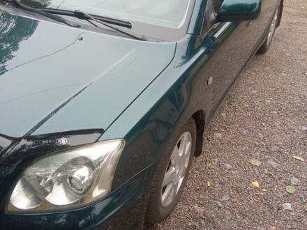 Зеленый Тойота Авенсис, объемом двигателя 2 л и пробегом 236 тыс. км за 4800 $, фото 1 на Automoto.ua