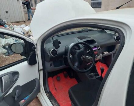 Білий Тойота Айго, об'ємом двигуна 1 л та пробігом 147 тис. км за 4800 $, фото 2 на Automoto.ua