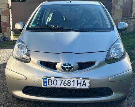 Бежевий Тойота Айго, об'ємом двигуна 1 л та пробігом 157 тис. км за 4599 $, фото 1 на Automoto.ua