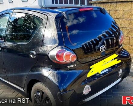 Черный Тойота Айго, объемом двигателя 1 л и пробегом 160 тыс. км за 4500 $, фото 1 на Automoto.ua