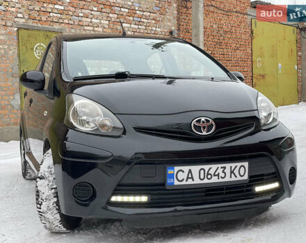 Черный Тойота Айго, объемом двигателя 1 л и пробегом 174 тыс. км за 6500 $, фото 1 на Automoto.ua