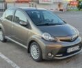 Коричневий Тойота Айго, об'ємом двигуна 1 л та пробігом 202 тис. км за 5000 $, фото 1 на Automoto.ua