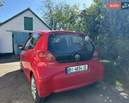 Червоний Тойота Айго, об'ємом двигуна 0.99 л та пробігом 156 тис. км за 5600 $, фото 2 на Automoto.ua