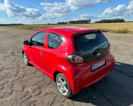 Червоний Тойота Айго, об'ємом двигуна 1 л та пробігом 82 тис. км за 4200 $, фото 3 на Automoto.ua