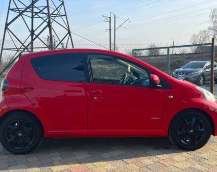 Красный Тойота Айго, объемом двигателя 1 л и пробегом 145 тыс. км за 4600 $, фото 7 на Automoto.ua