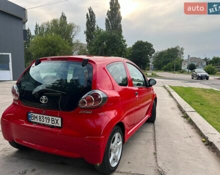Красный Тойота Айго, объемом двигателя 1 л и пробегом 88 тыс. км за 4000 $, фото 1 на Automoto.ua