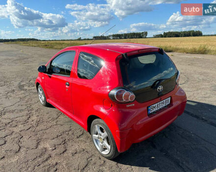 Красный Тойота Айго, объемом двигателя 1 л и пробегом 82 тыс. км за 4200 $, фото 2 на Automoto.ua