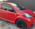 Красный Тойота Айго, объемом двигателя 1 л и пробегом 150 тыс. км за 3500 $, фото 1 на Automoto.ua