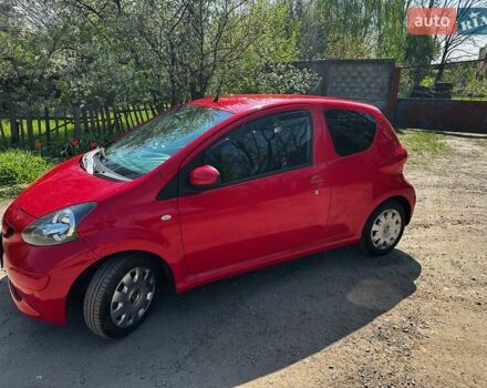 Червоний Тойота Айго, об'ємом двигуна 1 л та пробігом 140 тис. км за 3400 $, фото 1 на Automoto.ua