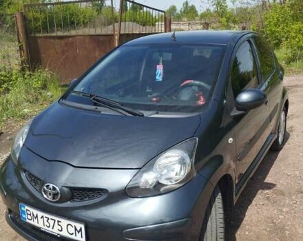 Сірий Тойота Айго, об'ємом двигуна 1.4 л та пробігом 61 тис. км за 5000 $, фото 4 на Automoto.ua