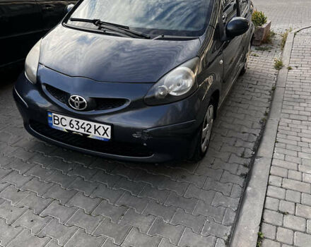 Сірий Тойота Айго, об'ємом двигуна 1 л та пробігом 159 тис. км за 5900 $, фото 1 на Automoto.ua