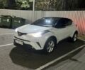 Белый Тойота C-HR, объемом двигателя 1.2 л и пробегом 92 тыс. км за 18700 $, фото 2 на Automoto.ua