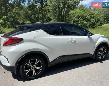 Белый Тойота C-HR, объемом двигателя 1.2 л и пробегом 81 тыс. км за 19000 $, фото 12 на Automoto.ua