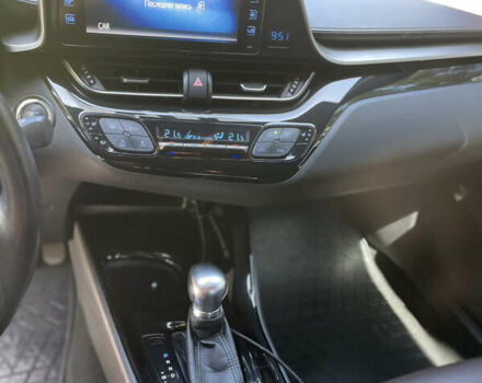 Белый Тойота C-HR, объемом двигателя 1.2 л и пробегом 81 тыс. км за 19000 $, фото 36 на Automoto.ua