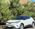 Белый Тойота C-HR, объемом двигателя 1.2 л и пробегом 103 тыс. км за 19500 $, фото 1 на Automoto.ua