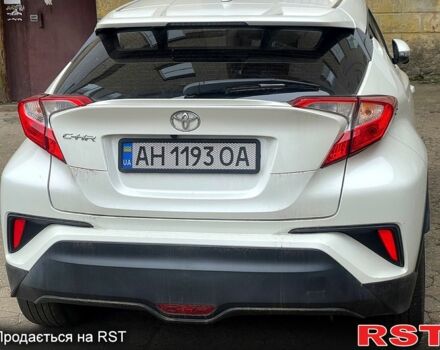Белый Тойота C-HR, объемом двигателя 2 л и пробегом 42 тыс. км за 17000 $, фото 2 на Automoto.ua