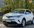 Белый Тойота C-HR, объемом двигателя 1.2 л и пробегом 57 тыс. км за 18750 $, фото 1 на Automoto.ua