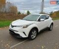 Белый Тойота C-HR, объемом двигателя 1.2 л и пробегом 93 тыс. км за 18698 $, фото 2 на Automoto.ua