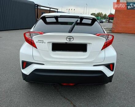 Белый Тойота C-HR, объемом двигателя 1.2 л и пробегом 93 тыс. км за 18700 $, фото 10 на Automoto.ua