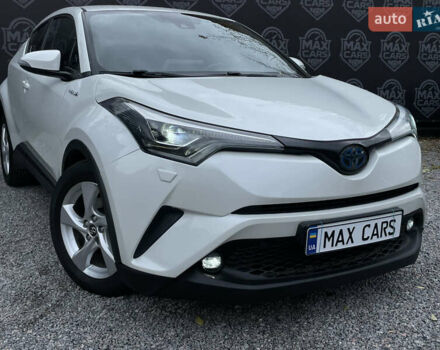 Тойота C-HR 2018 у Києві на Automoto.ua Білий Тойота C-HR, об'ємом двигуна 1.8 л та пробігом 74 тис. км за 22900 $, фото 2 на Automoto.ua
